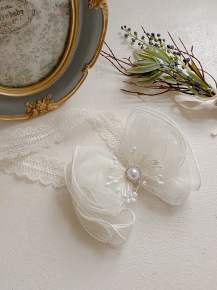 Bebe Pearl Tassel Hair Band