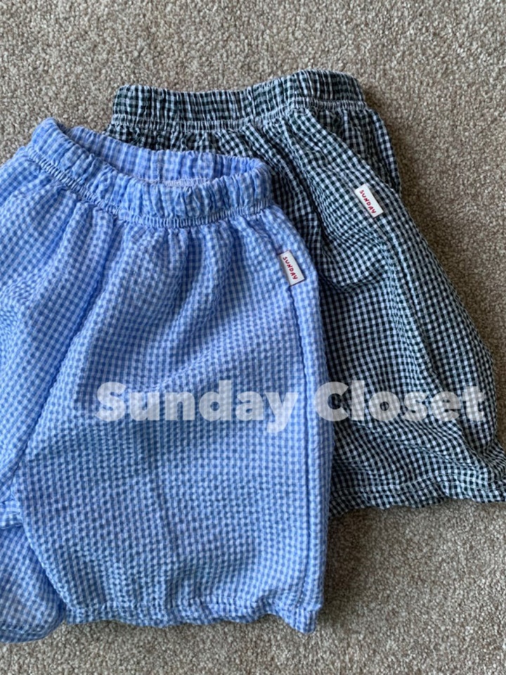 Jijimi Check Shorts